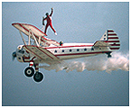 Wing walking on the top wing of a Super Stearman